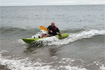 Kayak surfing the Feelfree Nomad Sport