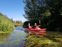 Canoe Shop staff cruising through calm waters