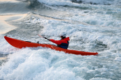 Using the Palm Fuse Adventure Jacket to stay dry while surfing in ocean swells