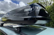 Thule Ocean 200 Roof Box, fixed to WingBar Evo with tool free U-Bolts
